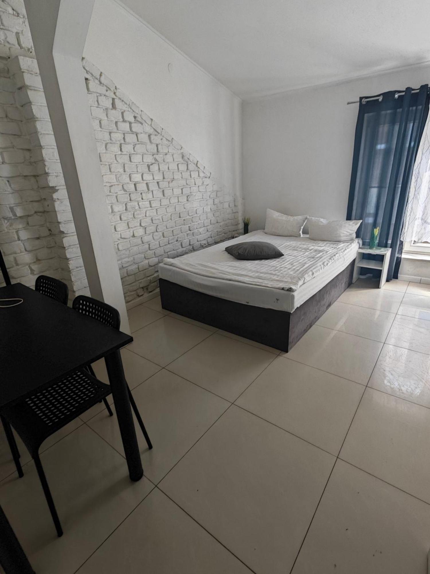 Apartamenty Wilcza - City Center Варшава Стая снимка